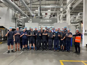 staff holding awards